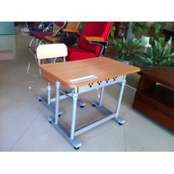 Bộ bàn ghế học sinh Hòa Phát cho bé vào lớp 1 khung sắt mặt gỗ melamine BHS28-1